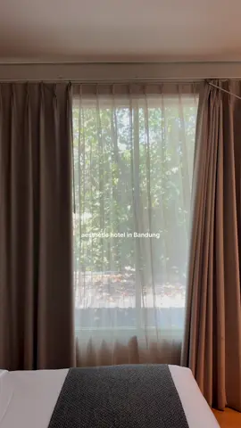 A warm Bandung stay I won’t forget🤍 Cozy room, soft lights, and you also should try the café downstairs, I sat there for hours, just watching, thinking, resting. A little reset in Bandung✨