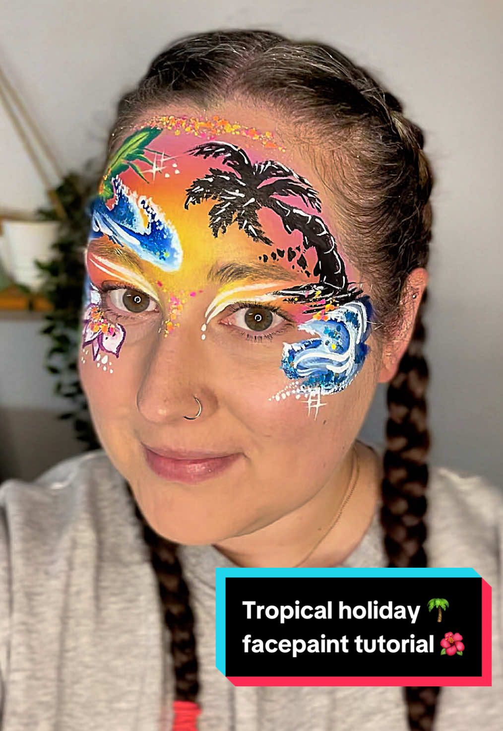 Tropical beach facepaint tutorial!🏝️🌺 I love a palm tree silhouette🌴 Who now wants to jet off on holiday after watching this??🙋🏻‍♀️ #facepainting #tropicalbeach #beachbraids #colourfulmakeup #holidayfacepaint #tropicalfacepaint 