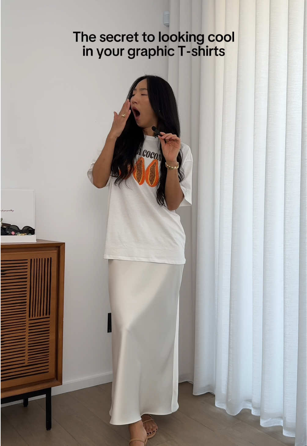 No hate on a graphic t and a satin skirt but if you want switch things up, try fun pull on pants! #summeroutfits #graphictshirt #casualoutfit 