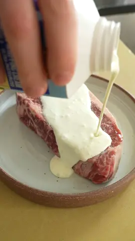🥩Cream Seared Steak! Believe it or not this isn’t some bunk engagement hack. Cream searing is a genuinely interesting technique that adds a toasty, deeply savory, caramelized color and flavor to your food. For the record, this was not my idea rather the work of @ideasinfood. Sometime last year I watched as they cream seared what felt like the entire world. One cool thing is you can cream sear all sorts of stuff. Think sweet like cream seared cinnamon rolls or savory like this steak. I’ve been wanting to try it ever since, and finally made it happen when I spotted a gorgeous little bone-in NY Strip at the butcher. Oh, and those truffles are from @rareteacellar. I got them a couple months ago and when they were about to go bad I decided to suspend them in Armagnac. They’ve been slowly leeching into the liquor since early June and the infused armagnac is actually insane. So pungent and earthy, but still peppery and slightly sweet. I thought it would go great in this here lil impromptu steak au poivre (French steak with peppercorn sauce).  Anyway, I want to do more of this. Let me know in the comments what you think we should cream sear next. #cooking #steak #peppercornsauce #steakaupoivre