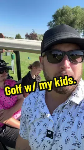 Golfing with my kids wear my @Flagstick50 gear! #flagstick50 #golf #golftok #dadsoftiktok #parenting 