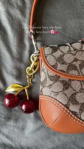 It just makes every bag look so cute 😭 #cherrykeychain #bagcharm #purse #pursecharms #cherrycharm 