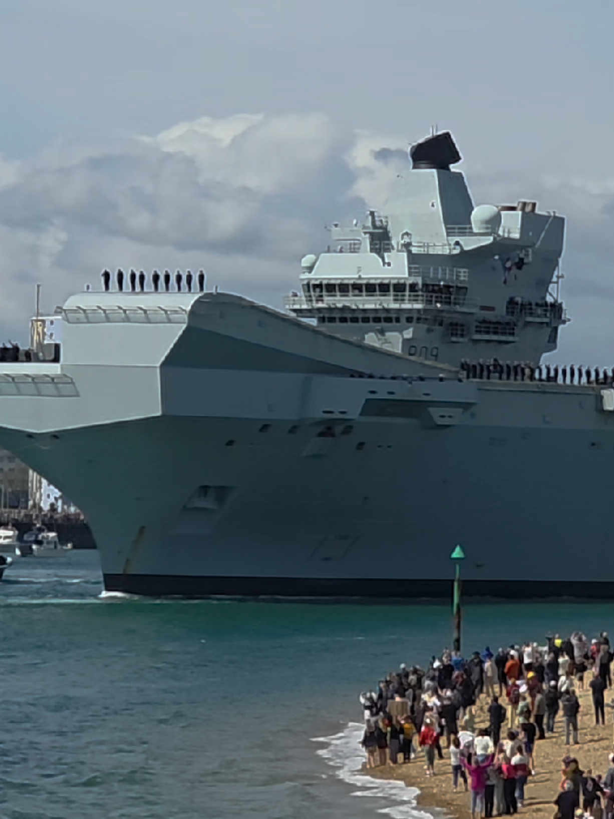 HMS Prince of Wales seen departing Portsmouth navy base for deployment in the uk carrier strike group.#royalnavy #nvayship #aircraftcarrier #war #hmsprinceofwales #fyp #onemanstravles #youtubers 