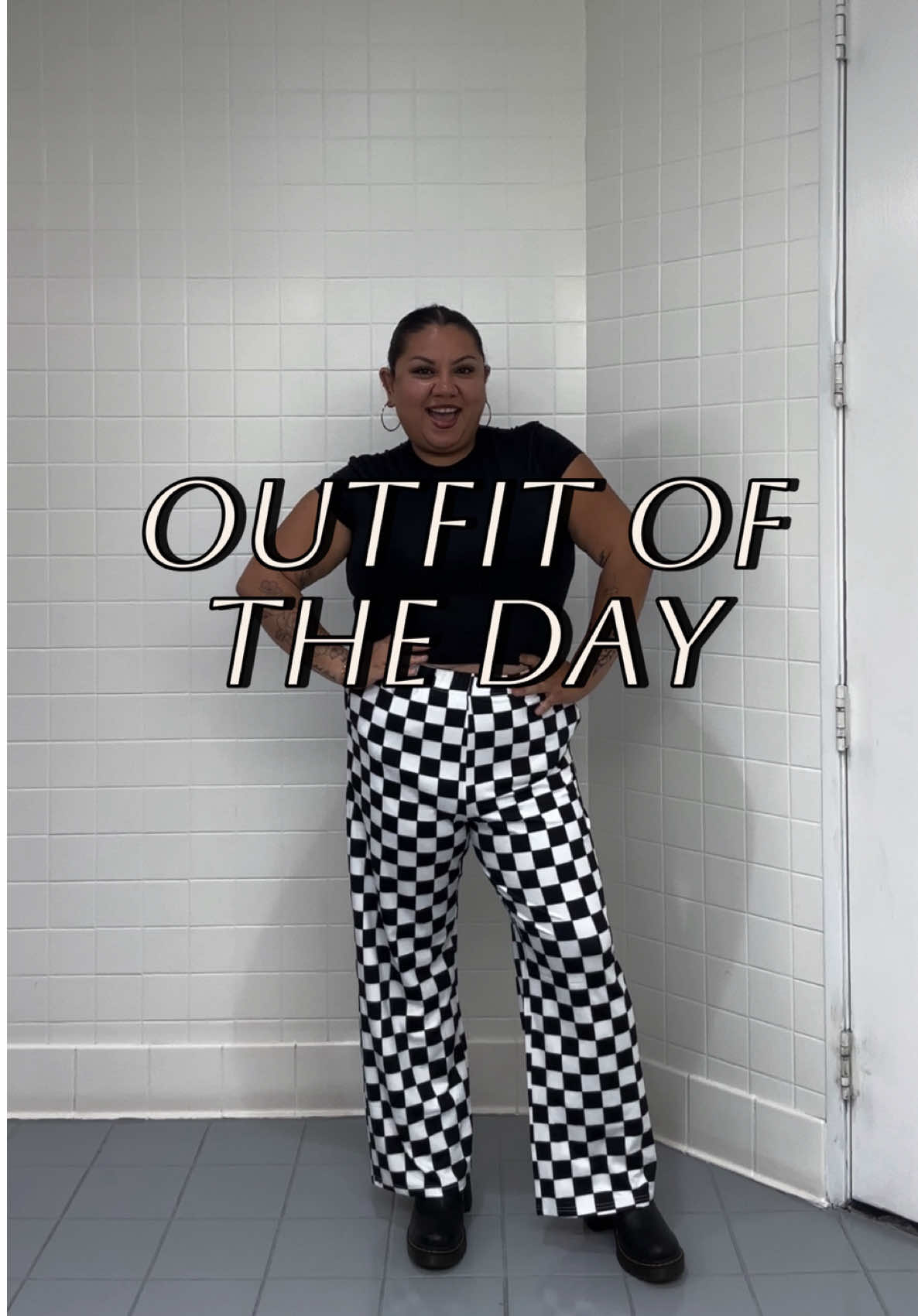 My obsession with all things checkered is manifesting into my outfits 🏁😮‍💨 🖤OUTFIT DEETS🖤 Shirt: @H&M  Pants: @Amazon Fashion  Boots: @Dr. Martens  Hoops: @ValentinajewelryCo  #altoutfitideas #altworkoutfit #checkerprint #ootds 