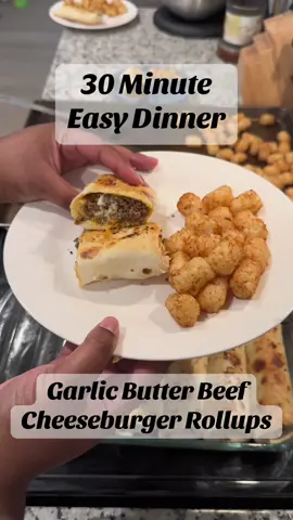 Garlic Butter Cheeseburger Rollups! I doubled this recipe and made 10 rollups with some meat leftover. 1 lb ground beef ½ cup shredded cheddar cheese ½ cup shredded mozzarella cheese 4 large flour tortillas ¼ cup butter, melted 3 cloves garlic, minced 1 tablespoon Worcestershire sauce 1 teaspoon onion powder 1 teaspoon garlic powder ½ teaspoon smoked paprika Salt and black pepper, to taste Instructions 1. Preheat the Oven: Set your oven to 375°F 2. Cook the Beef 3. Season the Beef Stir in Worcestershire sauce, onion powder, garlic powder, smoked paprika, salt, and pepper. Mix well and remove from heat. Allow the beef mixture to cool slightly. 4. Prepare the Garlic Butter In a small bowl, combine melted butter with minced garlic. Stir well and set aside. 5. Assemble the Rollups Lay tortillas flat on a clean surface. Evenly distribute the beef mixture over each tortilla, then top with cheddar and mozzarella cheese. 6. Roll and Bake Roll each tortilla tightly, tucking in the sides to secure the filling. Place seam-side down on the baking sheet. Brush generously with the garlic butter. Bake for 12–15 minutes, until the roll-ups are golden and the cheese inside is melted and bubbly. #Recipe #EasyRecipe #dinner #DinnerIdeas #30minutemeals 