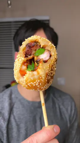 This is the 1st recipe I ever shared, back when only my personal friends were following along. I started making videos as a way to practice using my voice as an instrument and get over my self-consciousness from having a lisp as a kid.   I wanted to share it again because I am starting a new chapter in NYC and very soon, a new series, called “Feed your Feelings”, that intertwines cooking with personal reflection - the same way that this recipe reflected the jigsaw puzzle of my identity at the time I created it 🥹   It’s been about two years since I first shared this, and I hope my new friends here enjoy it if they haven’t scrolled all the way to the bottom of my reels 😂 Việt-Texas BBQ ☄️ Soursop + Durian Pork Belly Burnt End Bánh Rán • Translations from the video: - Bánh Rán/Bánh Cam = lightly sweet Vietnamese fried pastry made with glutinous rice flower, mung bean filling, and covered in sesame seeds - Mãng Cầu = soursop - Sầu Riêng = durian - Đồ Chua = pickled carrots + daikon 🥣 Ingredients Dough: • 16 oz glutinous rice flour • 8 oz rice flour • 1 cup sugar • 2 tbsp baking powder • 2.5 cups water • 2/3 cup mashed potato flakes • 1/4 cup untoasted sesame seeds Pork Belly Burnt Ends: • 1 lb pork belly • 1 cup choice seasoning (salt, pepper, cayenne, garlic, paprika, onion powder in video) • 2 cups BBQ sauce • 2 cups mashed fruit (soursop and durian in video) 🧾Instructions Pork Belly Burnt Ends: 1. Cut pork belly into 1.5” cubes then coat in seasooing. 2. Smoke at 250° F for 3 hours or until bark is deep mahogany. 3. Transfer pork belly to pan, then add BBQ sauce and fruit. 4. Wrap in foil and cook at 250° F for 2 hours or until internal temp is 200º F and meat is probe tender. 5. Unwrap and cook at 275° F for 30 minutes to caramelize sauce. Bánh Rán: 1. Combine glutinous rice flour and rice flour. 2. dissolve sugar and baking powder in water. 3. Mix mashed potato flakes into fluid. 4. Slowly and fully combine fluid with flour to form dough. 5. Keep water handy to prevent dough cracking. 6. Take one golf ball piece of dough and flatten. 7. Place burnt end in the center, then cup with hand. 8. Slowly work edges to connect into a ball. 9. Coat in sesame seeds. 10. Fry in 350° F coconut oil until golden. 11. Allow to cool, then enjoy! #vietnamesefood #vietnamesecuisine #cookingdiary