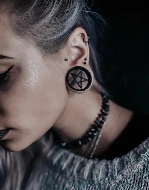 I had my ears gauged to a double zero 0️⃣ 0️⃣ in high school. Should I gauge my ears again? #witchtok #witchesoftiktok #🧿 #gauges #alternativegirl #alternative 