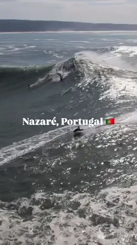 Here is @nicvonrupp on this monster from Nazaré a couple of years ago. #bigwaves #wave #explore #surfing #fyp 