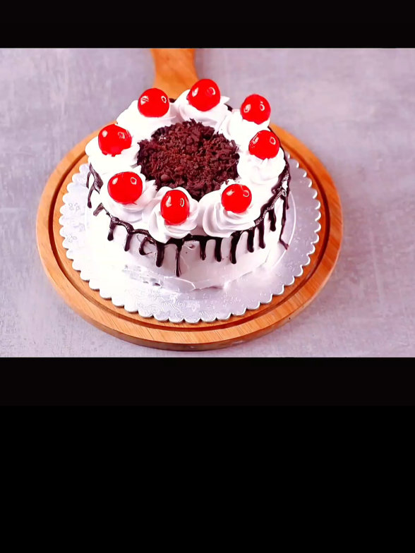 Black Forest cake eggless without oven  INGREDIENTS & PROCESS: ½ CUP YOGURT ¼ CUP OIL MIX 1 CUP FLOUR / MAIDA ¼ CUP COCOA POWDER 1 TSP BAKING POWDER ½ TSP BAKING SODA ¾ CUP POWDER SUGAR ½ CUP LIQUID MILK MIX WELL ½ TSP VANILLA EXTRACT BRUSH OIL & PLACE A BAKING PAPER PLACE A CURRY PAN & WIRE STAND PRE-HEAT FOR 5-7 MIN. -COOK IN LOW MEDIUM HEAT FOR 30-35 MIN. CAKE IS READY COOL COMPLETELY WATER ½ CUP SUGAR 2 TBSP CHERRY 5-6 PIECES  COOK FOR 2 MINUTES 1 CUP SWEETENED WHIPPING CREAM BEAT UNTIL STIFF PEAKS REMOVE THE CAKE FROM MOULD DIVIDE IN LAYERS SPREAD CHERRY SYRUP PUT A LAYER OF WHIPPED CREAM -KEEP IN FRIDGE FOR 20 MINUTES GRATE SOME CHOCOLATE CHOCOLATE GANACHE CREAM ROSETTE GRATED CHOCOLATE CHERRY ON TOP . . . #foryoupage #fyp #trending #egglessblackforestcake #nojovencake #viral #tiktokfood