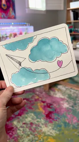 Supplies are my brand and are on my page https://www.adreamoradayart.com/ This is simple and I think if you were on a trip, it's the perfect way to send a personalized postcard that doesn't take long to make. 24 color essential palette Watercolor Postcard Size 8 round brush Artist pens Artist tape #easyartideas #watercolortutorial