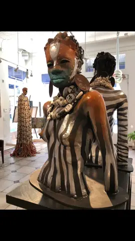 Walking into this gallery felt like stepping into a sacred space where ancestral memory, artistry, and spirit collide. The sculptures breathe life. Each one honoring African beauty, tradition, and resilience with reverence and bold creativity. I was deeply moved by the powerful presence in every piece. the textured skin, the intricate beadwork, the sacred adornments, the silence in the eyes. Ancestral echoes cast in clay and color. Gratitude to the visionary artist who created these masterpieces your work is a ceremonial offering to culture, history, and spirit. A must-visit if you’re ever in New Orleans. 🔥#fyp #BlackTikTok #africantiktok #artist #ancestors 