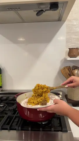your newest dinner rotation meal🍽️ ingredients: • bone in short rib (or meat of choice, i used thinner meat for a quicker cook) • carrots • onion •garlic (whole & crushed) • turmeric • cumin • salt • bay leaves •chicken & beef bouillon • rice steps for making plov(my version): 1. cut your beef meat off the bone & render the bones with a little butter & oil to get any of that leftover fat out. (dishes like these it's important to infuse as much flavor from the bottom up) 2. remove the bones and sear your meat in that fat. 3. once your meat has a near good sear, remove it and ada your onions on a low heat so it get a nice caramelized taste to them. 4. after about 15 minutes, add your carrot and cook for another 10 minutes. 5. add back your meat along side your crushed garlic back into the pot. cover and let cook another 5 minutes. 6. add all your spices and let them slightly toast before adding in your chicken/beef broth. 7. bring that to a slight boil before adding in your rice and leveling it out. add slight idents in the rice so the water can reach all the way to the bottom. (2:1 ratio for rice and water) 8. add your whole garlic in the middle and cover and let it cook for 45 minutes UNTOUCHED on low heat. 9. once the 45 minutes are done, do not open the lid yet and let it sit there covered for another 20 minutes with the heat off. 10. after all that time, it's now ready to enjoy serve with a light tomato and onion salad and that freshly roasted garlic.