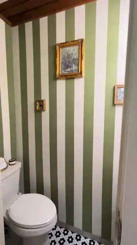 Updating my bathroom in my 1920’s house!  Naturally made it dachshund themed  #paint #stripedwalls #Home #homeimprovement #beforeandafter #oldhouse #oldhomes 
