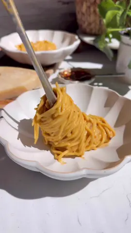Egg Yolk & Salsa Macha Spaghetti 🥵❤️  is it HEAVILY inspired by carbonara? You know it... but I don't think I'm legally allowed to call it that or the purists will murder me. I had been craving a spicy take on the creamy carbonara but with a touch of acid and no guanciale...this more than delivered. Ingredients: * 8 oz fresh spaghetti. * 1/3 cup + 2 tbsp parmigiano reggiano (freshly grated) + more for topping. * 2-3 tbsp chili crisp or salsa macha (plus more for topping). * 3 egg yolks. * 2 tsp soy sauce. * 2 tsp rice vin. * Salt and pepper to taste. Directions: 1. Add the yolks, parm, tamari, rice vin, salsa macha or chili crisp to a bowl and whisk well. Adjust for salt and pepper. 2. Bring water to a boil and add enough salt for it to taste oceany. 3. Cook your spaghetti to al dente. 4. Temper the yolks with 1/4 cup of the hot pasta water. 5. Add the spaghetti to another pan, add the tempered yolks and a bit more pasta water. Turn heat on low and whisk until emulsified and creamy. It'll be like 2 min. Make sure not to scramble the eggs. 6. Serve with more salsa macha and loads of parm. #pasta #spaghetti #EasyRecipes #eggyolk
