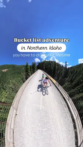 The Route of the Hiawatha, Wallace Idaho Bike through one of the most scenic stretches of railroad in Northern America on this 15 mile downhill trail that takes you through 10 tunnels and 7 sky-high trestle bridges.  Located right at the Idaho/Montana border, this family friendly adventure is absolutely one you must add to your Bucket List! Bike through the stunning pine forests and enjoy the breathtaking views over the mountainside.  Things to know:  🚲 Open daily through Mid-September, then closed for the winter 🚲 Bring your own bike, or rent from the Lookout Pass Ski area 🚲 They offer kid’s bikes, tag-alongs, and trailers to rent 🚲 Rent your bikes ahead of time online and have them delivered to the trailhead  🚲 Bring snacks and plenty of water- the trail will take several hours to bike 🚲 The tunnels are dark, so make sure to bring a headlamp! (provided with your bike rental)  🚲 The entire trail is downhill, making it totally doable for kids. Once you get to the end, ride the shuttle back to the top! 🚲 Recommended to start the trail no later than 1pm to make it in time for the last shuttle Would you ride this trail? #idaho #hiawatha 