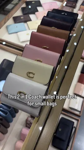 Reviewing the new Card Holder Wallet from @Coach This 2 in 1 wallet is perfect for traveling or going out-the back literally snaps off, giving you 2 separate pieces. What wallet do you want reviewed next? #coachretailemployee #coachny #handbagtiktok #coachbag 