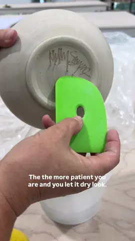 One of the most-asked questions I get: How do you clean up your signature?!? 😅 Here’s how to take it from rough and bumpy to clean and smooth 💥👇 🖊️ Step 1: Sign your pot when it’s that perfect leather hard — not too wet, not too dry — using a ballpoint pen. ⏳ Let it dry completely. Patience = way easier cleanup! 🧰 Step 2: Grab your @mudtools Rib Tool, a green scrubby thing, a sponge, and a bucket of water. ✨ Step 3: Use the Rib Tool to gently scrape off any raised clay. 🧽 Follow up with a rung-out sponge. 🌊 And if needed, buff it out with a fully wrung-out green scrubby for that final smooth finish! ⚠️ Just don’t buff too hard or you’ll erase your signature and have to re-sign it! 😆😆😆 Let it dry ➡️ clean it up ➡️ and your pot will go in smooth and come out even smoother! 🎥 Watch the video for the full process — and save this post for next time! #PotteryTips #StudioHack #SignatureCleanup #AtlantaPottery #ClayProcess #PotteryStudio #WheelThrowingTips