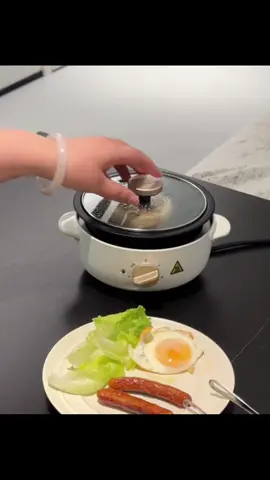 🍲✨ Your Mini Kitchen Powerhouse! ✨🍲 Meet the Small Multifunctional Induction Pot—big on features, compact in size! Perfect for quick meals, boiling water, or even making soup in a flash.  🌟 WHY IT’S A MUST-HAVE: ✔ FAST & EFFICIENT – Induction heating for quick and even cooking  ✔ COMPACT SIZE – Ideal for small spaces, dorms, or offices  ✔ MULTI-USE – Boil, simmer, or steam with one pot  ✔ EASY TO CLEAN – Non-stick surface for hassle-free cleanup  🍜 PERFECT FOR: • Quick ramen fixes 🍜  • Single-serve meals 🥘  • Travel or camping trips 🏕️  #KitchenEssentials #InductionCooking #SmallButMighty #QuickMeals #SmartKitchen