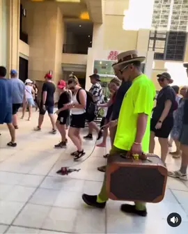 Man walking his pet fish in public 🎣 😂😂
