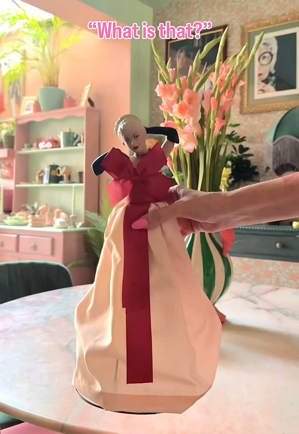 “WHAT ON EARTH IS THAT.” - James Shore So I was out when my 1940’s burlesque doll turned up and James called me to ask “what on earth it was” , I think he thought it was one of those toilet roll covers our grandmas used to have 😂😂. I love vintage, I love burlesque, she has a beautiful face and I had a plan.  She already had a wire lamp base under her skirt but I couldn’t be bothered with getting her all wired up. I bought a vintage look bulb holder and a rechargeable bulb 💡. It has a remote so I can turn her on from the sofa and it even has a timer to set when she turns on and off.    I know she maybe not everyone’s cup of tea but I think she looks fab on my sideboard day and night and fits in well to my eclectic, weird home.  What’s your opinion?  #weirdstuff #vintagefinds #burlesque #vintagedoll #vintagelamp #eclectichome #eclectichomedecor #vintagehomedecor 