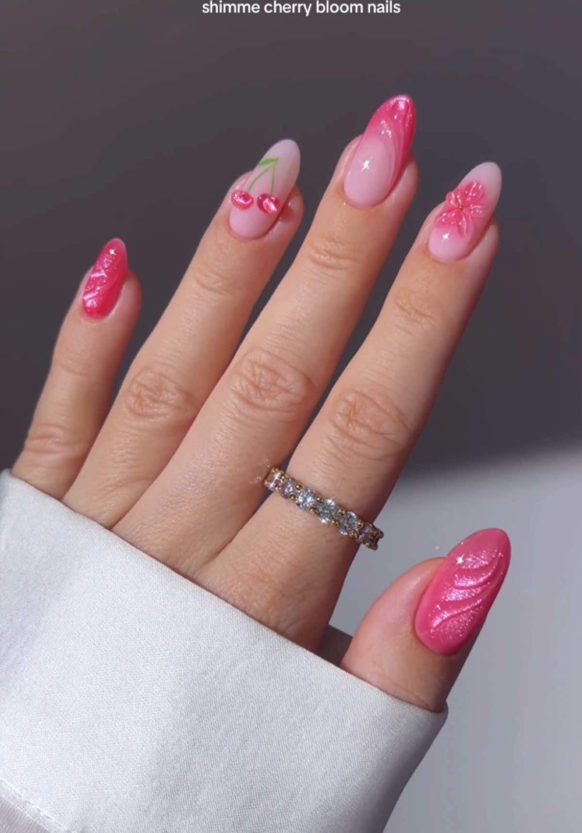 🌸🍒💕 cherry sweet with a floral twist and just the right amount of sparkle ✨ •ad | using @Kiara Sky Professional Nails builder gel Amore | Pink Luster | NYE | Leaf It Alone | Going Nuts | Sunny Daze | Blank Slate | Rub On Top Coat | Flex Gel | 4-in-1 gel nail glue  Discount code: GREATNAILS  _____ *affiliate #pinknails #summernails #nails #nailinspo #diynails #naildesign #nailtutorials #nailart  3D glass flower nails #cateyenails 