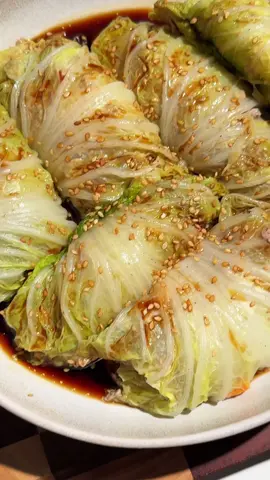 Think dumplings but make it high protein and low carb. Juicy filling, tender cabbage wrap, and full of flavor.  Ingredients ½ pound ground beef or pork 4 ounces of tofu squeeze out excess water and smoosh 2 tbsp soy sauce 1/2 tbsp chicken bouilon powder 1/3 onion, diced 1/2 carrot, diced Salt Napa Cabbage 2 tbsp light soy sauce 1/2 tbsp dark soy sauce Drizzle Sesame oil 1/2 tbsp oyster sauce 2 tbsp water For full recipe, search cabbage roll dumplings on my blog linked in bio #dumplings #highprotein #proteinrecipes #cabbagerolls #EasyRecipes #highproteinrecipes #cabbagerecipes #lowcarb #lowcalories #asianrecipes
