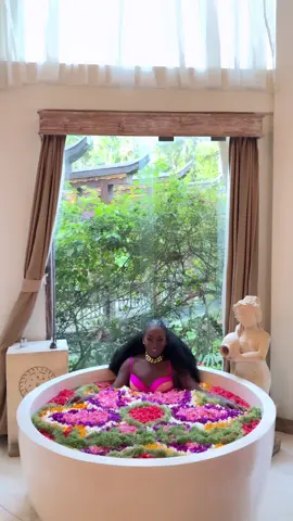 I don’t gate-keep the good life! This experience with a full meal only cost me $50 🛁💐🍽️ Bali Baller 💴  $1 USD = 16,000 Rupiah 🤑 I’m “rich, rich” over here! Bali is the place to go when you’ve got champagne taste on a beer budget 🥂🍻 Tag your travel crew and tell them: “This is our sign to book Bali ✈️💐” #fyp #flowerbath #bali #travelexperience 