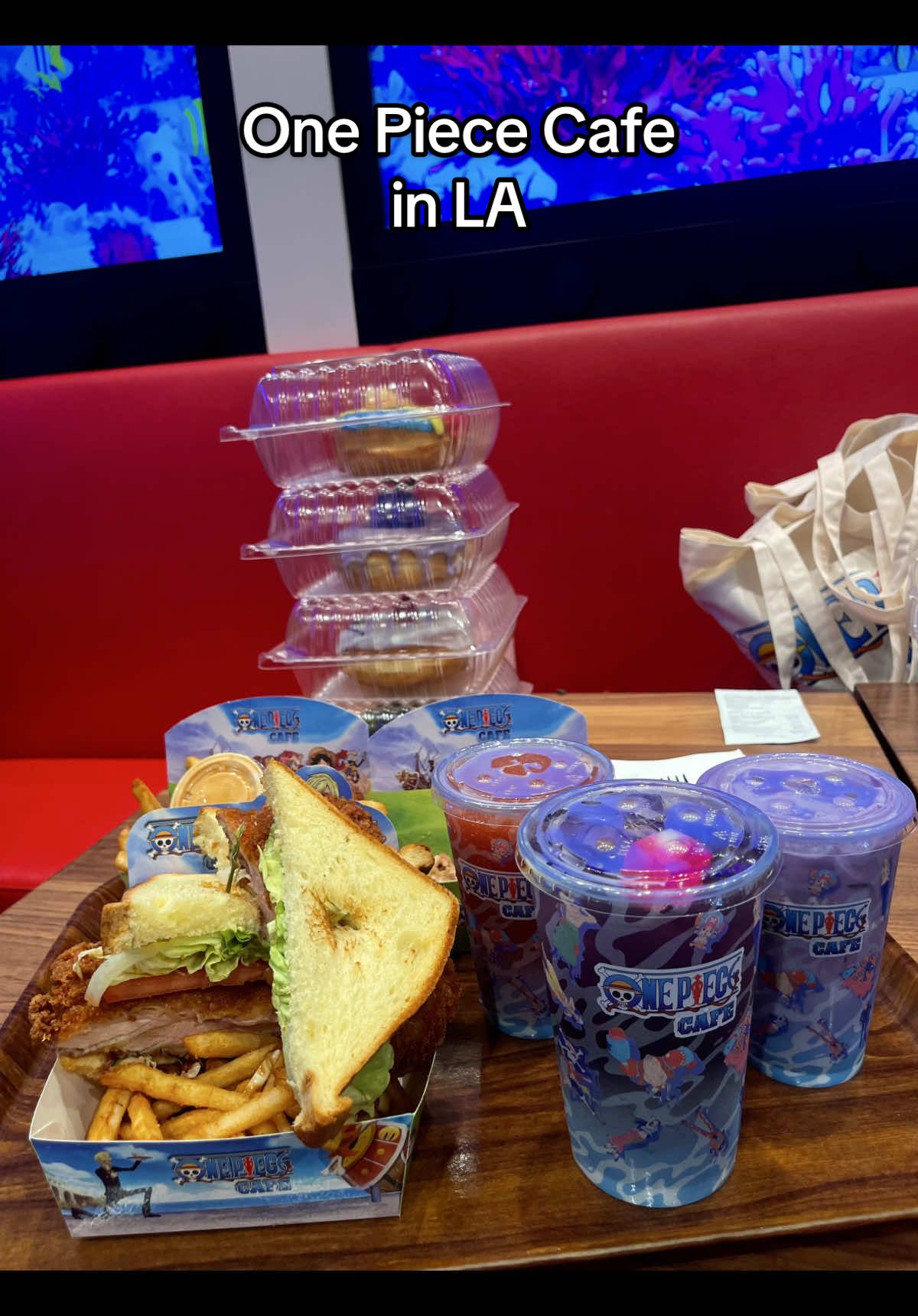 I got Sanji's Chicken Katsu Sando, and it was delicious! We also ordered a side of fries and chicken. The drinks we got were Robin's Flower-Flower Power Refresher, Jinbe's Ocean Burst Slushy, and the Gum-Gum Ube Horchata! Everything was so good, and I would definitely recommend visiting! #onepiececafe #onepiece #onepiececafelosangeles #anime #luffy 