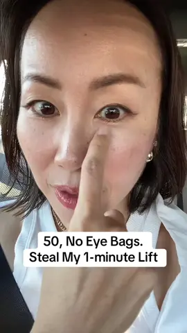 I do this in the car—because tired eyes can age you 10 years.  We drive every day… why not use that time to reverse aging? Let’s focus on the under-eye area.  Once this part starts sagging, it changes your whole face.  I started noticing it in my 40s—and that’s when I began this simple eye workout.  Now at 50, my under-eye sagging has dramatically improved. Here’s what you do:  1. Stick your tongue out just a little and hold it gently with your front teeth Why? It prevents you from clenching your jaw and helps activate the right facial muscles without tension.  2. Lift the muscles under your eyes 20 times 3. Hold the lift for 20 seconds   Repeat 2–3 rounds, Then relax the area with under-eye shiatsu (I share more points in my free guide!) Tips: Don’t overdo the tongue—just a tiny bit out is enough Focus on lifting the under-eye muscles only, not the forehead Great for de-puffing, preventing sagging, and waking up tired eyes! Let me know in the comment how you feel after! #faceworkout #facefitness #faceyoga #antiaging #reverseaging 