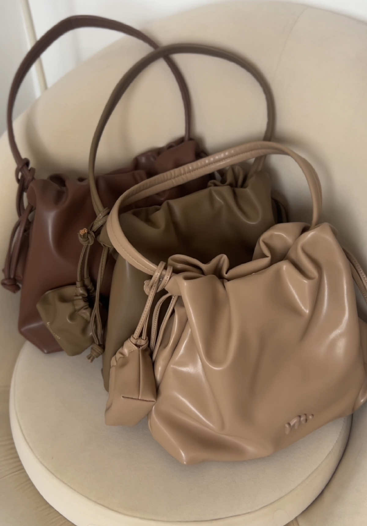 Replying to @Angelina Jologs @MOSSDOOM.PH Danica bag in coffee, elephant grey, and apricot :) #cloudbag #drawstringbag #schoolbag #officebag  #trendingbag #mossdoomdanicabag #mossdoombag