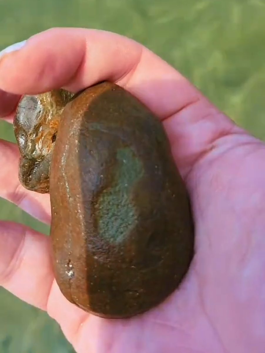 It's the TikTok symbol!🎶😆 #tiktok #rock #rocks #lake #rockhunting #lakehuron #tiktokrock #makeitviral 