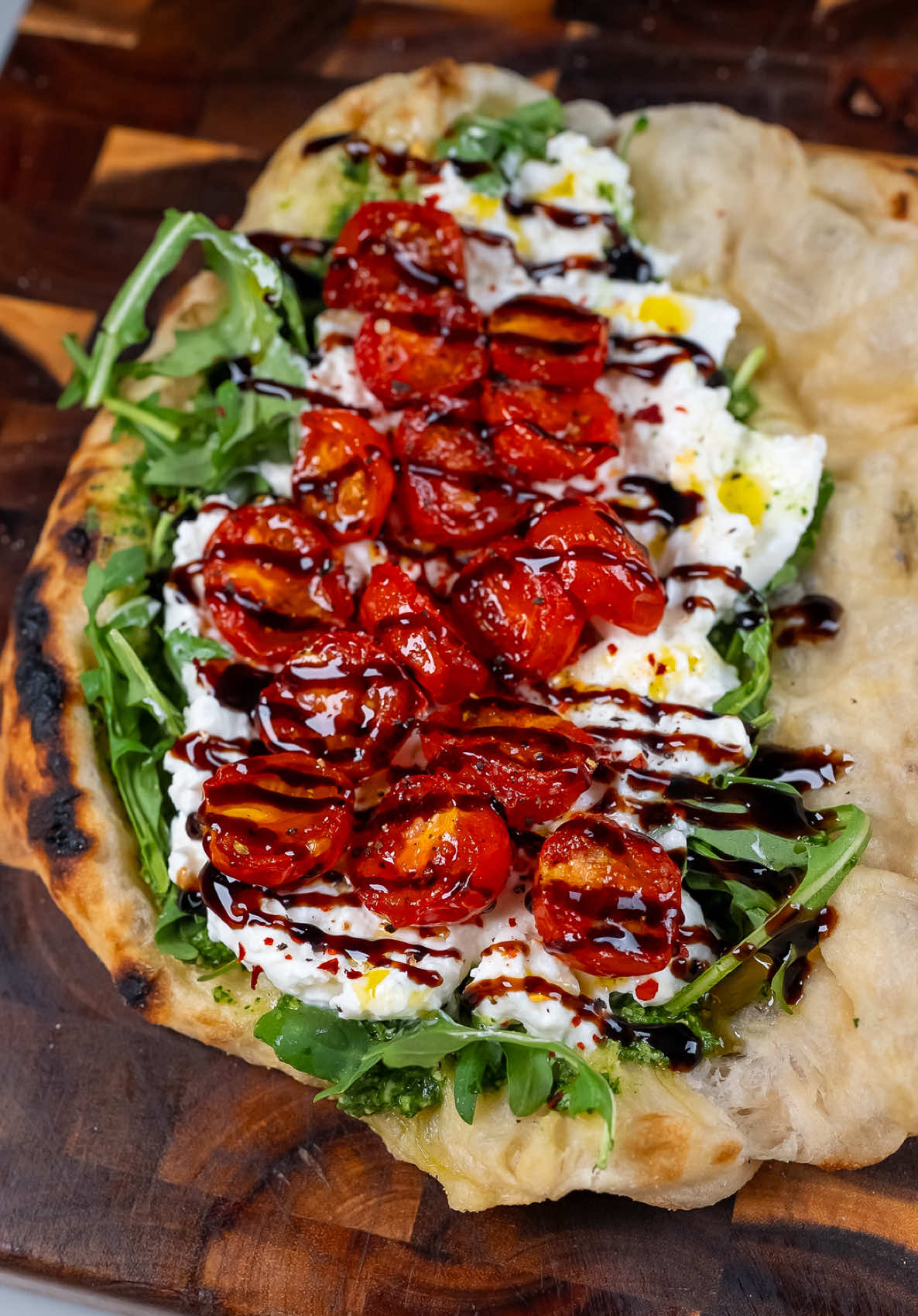 Burrata Caprese Pizza Sandwich  Finally made the pizza sandwich I’ve been thinking about for months. Crispy dough, burrata, pesto, seared tomatoes, arugula, balsamic glaze.  It hits all the right notes and definitely helps ease the FOMO of not being in Italy this summer. #burrata #sandwich #pizzasandwich #pizza #caprese #pesto #EasyRecipes #homemadepesto #fyp  Burrata sandwich Caprese sandwich Pizza sandwich Caprese pizza Burrata pizza recipe