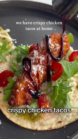 My take on crispy chicken tacos but with a pesto twist 😍 Y’all gotta try these! They were too good. I share recipes every week so follow along if you’re into that sort of thing 😉  ✨Crispy Chicken Tacos w/ Pesto on garlic butter tortillas ✨ What you’ll need: 2 tortillas Crispy Chicken (homemade or store bought) Mozzarella Arugula Tomatoes Balsamic Glaze Fresh Basil Garlic Butter -Cook your chicken according to package directions. -Place some garlic butter in pan and melt. -Add your tortilla and turn it over to coat both sides.  -Cook in the pan until it gets somewhat crispy. -Spread pesto in your tortillas and add the arugula, mozzarella, chicken, chopped fresh basil and balsamic glaze.  -I hope y’all enjoy!   #crispychicken 