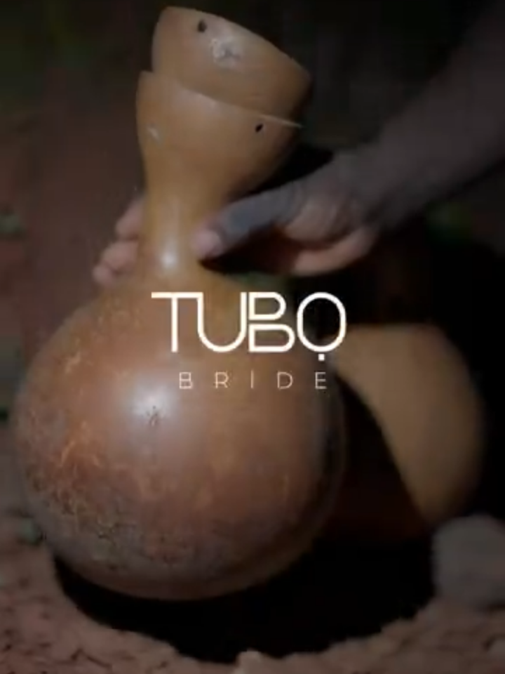 In the quiet heartbeat of Enugu lies Ozom Aguobu-Owa, the ancestral home of Dr. Chelsea Ezeilo. Here, love isn’t just celebrated, it is storied, rooted, and adorned in meaning. This is more than my usual wedding or #BTS content. It’s the story that inspired us to create Chelsea’s dress, a custom couture masterpiece specially bespoken for THE MOST BEAUTIFUL #TUBOBRIDE EVER! @dr.chelseaezeilo where every detail is a tribute to her heritage. From the palm wine tree motif to the glint of each crystal bead and the palm wine drops into the pot, nothing on this piece was random.  In fact, Chelsea’s wrapper is a love letter from her husband, detailed with inscriptions in Igbo language, so watch out for episode 2 🥰 Every single bead was hand-sewn by our #TUBOartisans, each stitch carrying the weight of tradition and the pride of a people. This is African culture, not just worn, but immortalized in #CUSTOMTUBO fashion. This is why we create. This is why we tell stories. Because when culture meets couture, legacy becomes untouchable. 🎬 Produced by Sandrah Tubobereni @tubobereni_  👗 #CustomTUBO by @tubo__ 🎥 @_avidstudio  💍 For Dr. Chelsea Ezeilo  Styled by the best bridal stylist @thewardrobemanager #TWMBride 🫶🏽