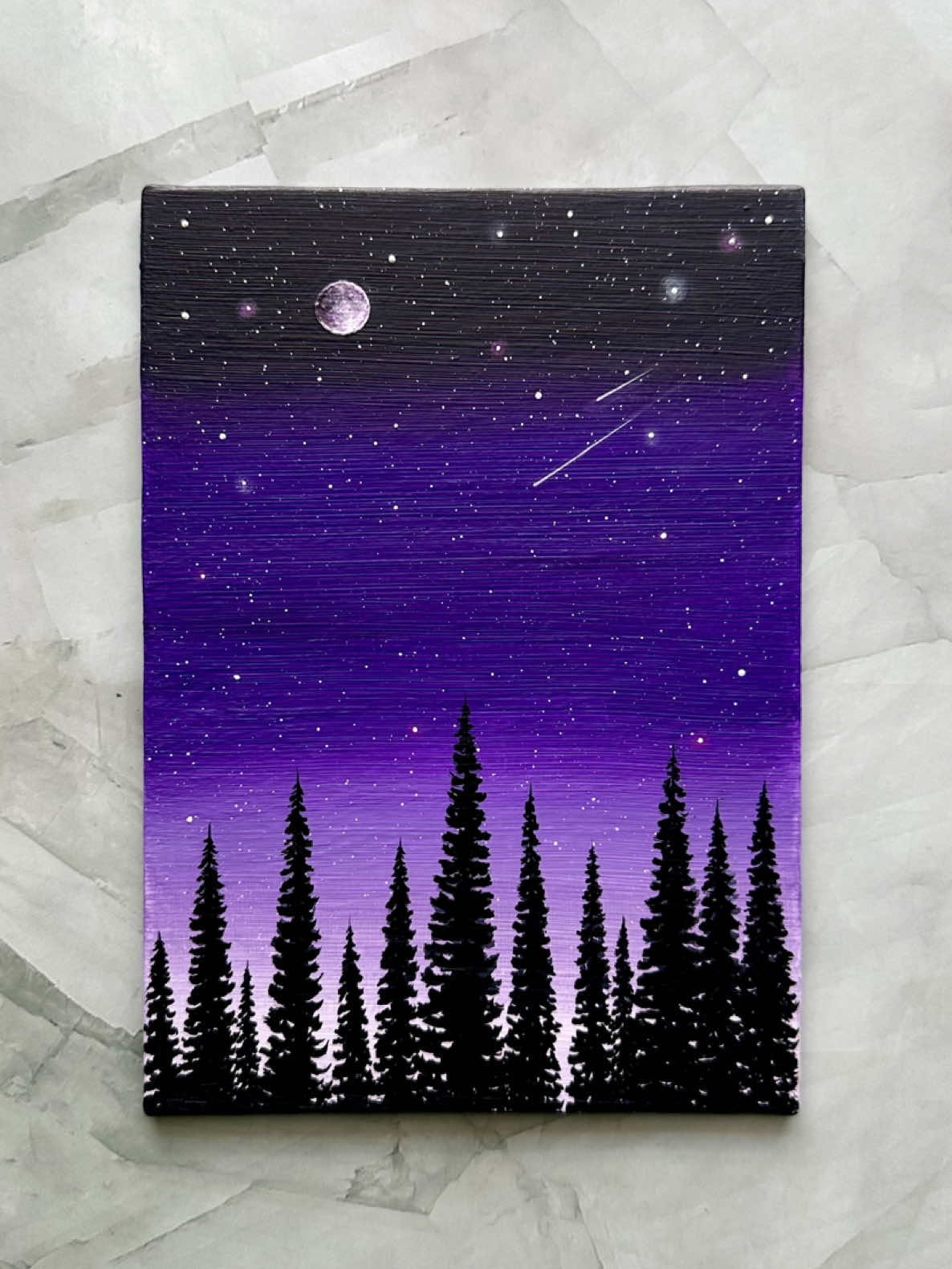 stardusk 💜🌙✨🌌 i painted this sky to feel like a soft little escape—violet fading into stars, with a quiet moon watching over the trees. ever just need to paint to clear your head? 🥹 ✨ save this for your next painting inspo 🎨: violet, ivory black, lavender, titanium white #paintingprocess #acrylicpainting #paintingtutorial #arttok #satisfyingart 