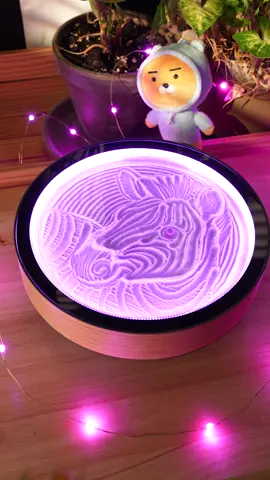 African elegance in flowing sand. The Oasis Mini sculpts a magnificent zebra, its distinctive stripes and graceful form emerging through shifting grains, bringing the wild beauty of savanna wildlife to your desktop with mesmerizing motion.