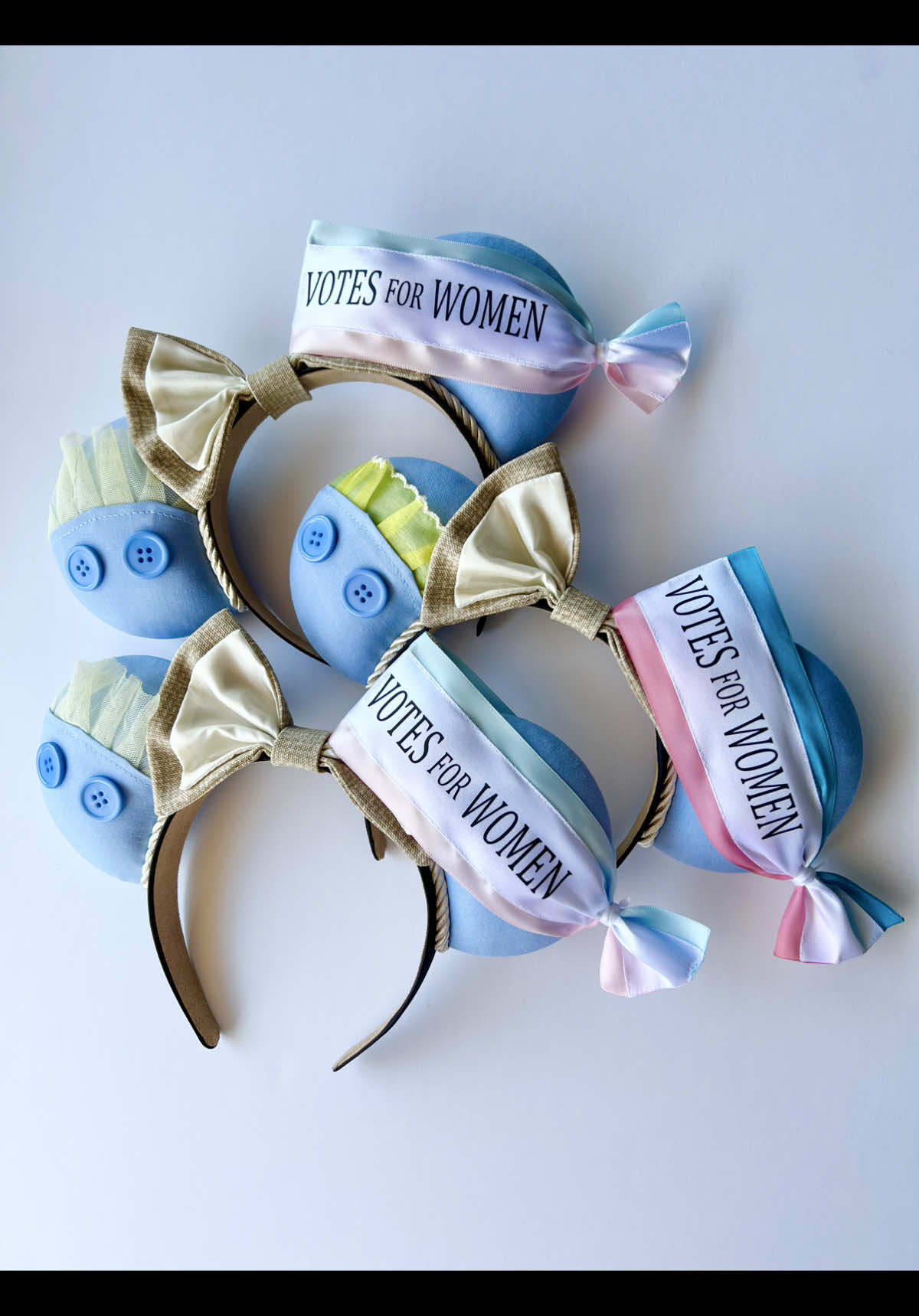 The song that runs through my head every morning when I read the news 🫠 Mrs. Banks is my favorite character in Disney’s Mary Poppins (don’t tell Mary Poppins I said that) so when I was going to vote in the 2020 election I knew I needed a special pair of ears to honor 100 years of women having the right to vote! I made the first pair to wear that day when I cast my vote and I have worn them to vote in every election since. It may be a silly thing to wear mouse ears to the voting booth, but it’s a reminder of the strong women (both white and black) who have come before me who fought and died for their right to vote and it’s a reminder of what I am hoping to accomplish with my vote  These ears are so so special to me and it makes me happy that so many of you love them too and understand the message behind them!  Every time I wear these mouse ears to Disneyland I am stopped by women telling me that they love them and a lot of the time people simply sing the song “Sister Suffragette” at me and I happily join in! They’re more than a fashion statement and I love that about them 🥹  #disneyland #disneyfashion #disneystyle #fyp #votesforwomen 
