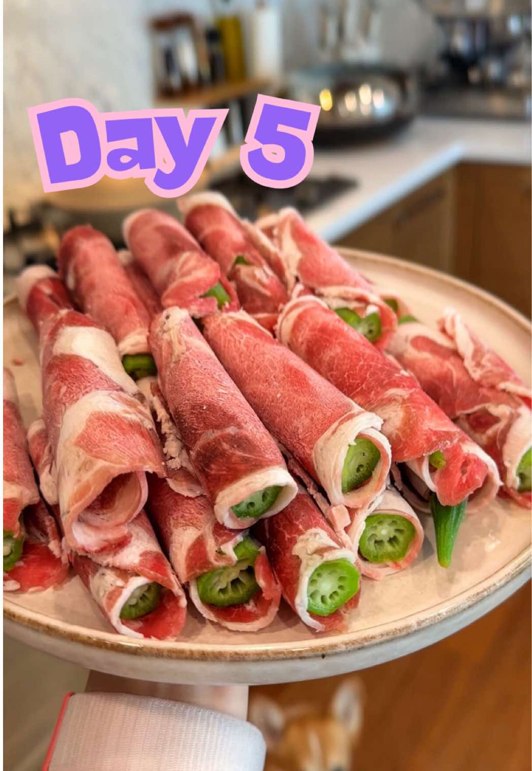 [ DAY 5 ] Okra + Hot Pot Beef Rolls 🥩🥬 ingredients: - 11 oz beef hot pot rolls (frozen) - 1 pkg okra (approx 20-30) - 2 eggs, beaten - 5 napa cabbage leaves - 1 cup seafood mushrooms Sauce - 1/2 cup water - 1 1/2 tbsp soy sauce (adjust to personal preference) - 1/2 tbsp mirin - 1 tbsp sesame oil - 1 tbsp garlic, minced - 1/2 tbsp corn starch 1. In a pot of boiling water, cook okra for 2-3 minutes. This will help remove some of the slimey taste. 2. Cut the tops off okra and insert 1-2 pcs of okra into each frozen meat roll. 3. In a small bowl, combine sauce ingredients. 4. In a non-stick skillet on medium heat, cook napa cabbage and mushrooms for 3 minutes with a bit of oil until wilted and water from mushrooms have evaporated.  5. Add in your meat/okra rolls and pour in the sauce. Cover and let simmer for 3 minutes. Flip the meat rolls over and simmer for another 1-2 minutes. 6. Pour in eggs and once eggs are 80% cooked through, turn off heat, and serve over hot rice!  Okra is low in carbs but high in fiber, vitamin C, and antioxidants — and this whole dish has around 50g of protein! 🌟 Follow for Day 6 of my 15 Day High Protein Low Carb Series 🌟 #EasyRecipe #okra #15dayhighproteinlowcarbseries #beefrolls #lowcarbrecipes #highprotein #onepandinner #asianrecipes