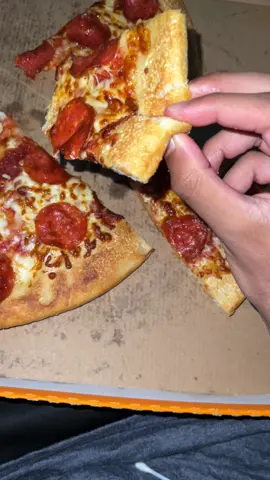 Eatting a whole box of pizza