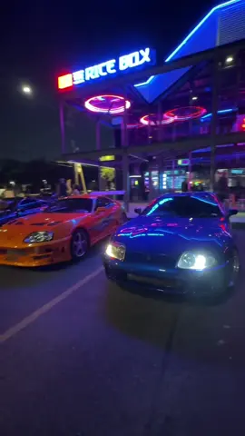 Enjoying the the lights at @The Rice Box @rogerritch #supramk4 #mkivsupra #mkivsupraowners #supranation #fastandthefurious #isthatasupra #food #nightsnack #asianfood #americanfood #mixedfood 
