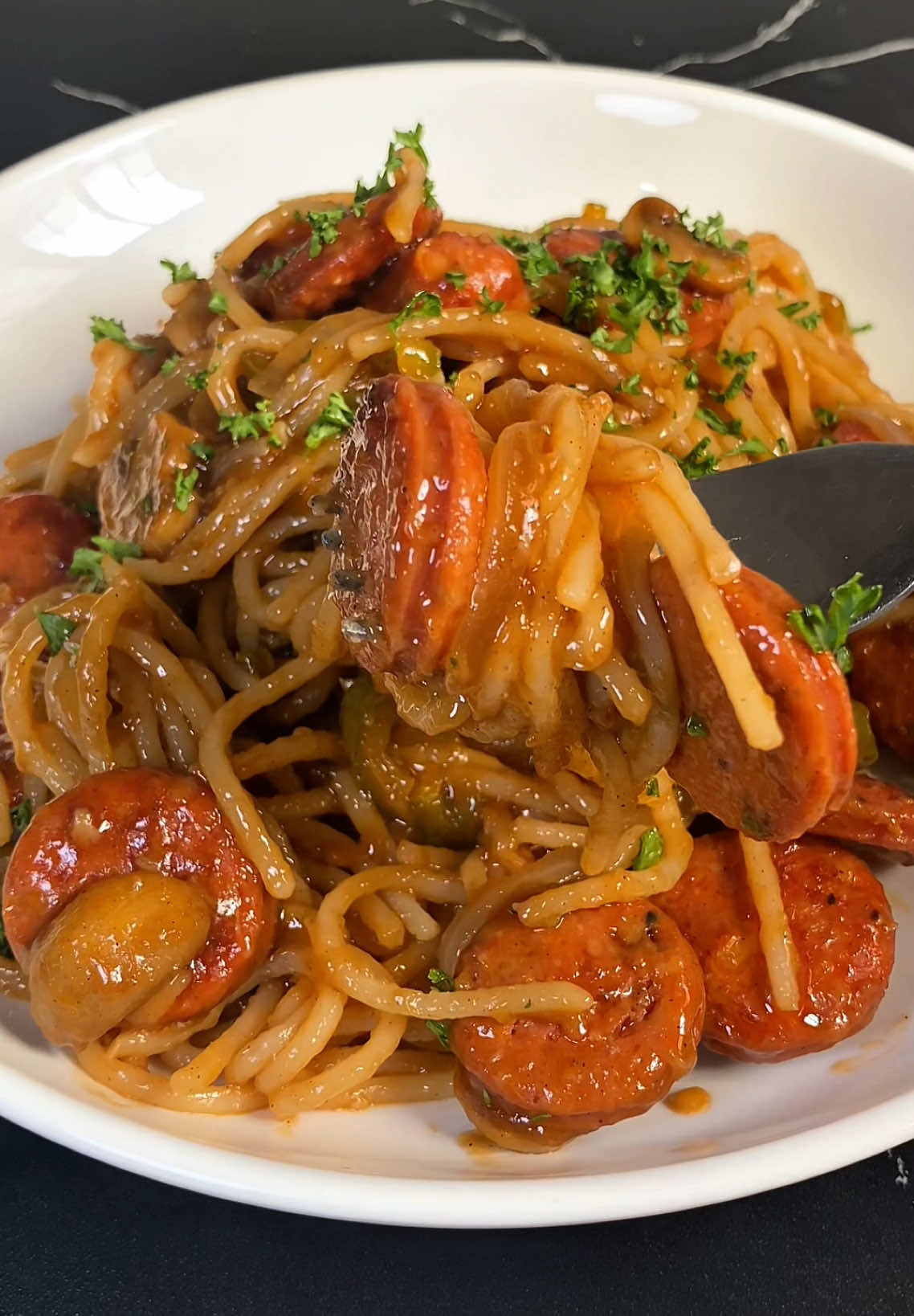 Napolitan Pasta 🍝 #EasyRecipe #pastalover #pastarecipes Ingredients: 	•	200g pasta 	•	3 cloves garlic, minced 	•	1 medium white onion, sliced 	•	1 medium red bell pepper, sliced 	•	1 medium green bell pepper, sliced 	•	300g chicken sausage sliced 	•	½ cup ketchup 	•	¼ cup oyster sauce 	•	1 tbsp unsalted butter 	•	1 tbsp Lea & Perrins Worcestershire sauce 	•	½ tsp ground pepper 	•	½ tsp salt to taste  	•	½ cup pasta water
