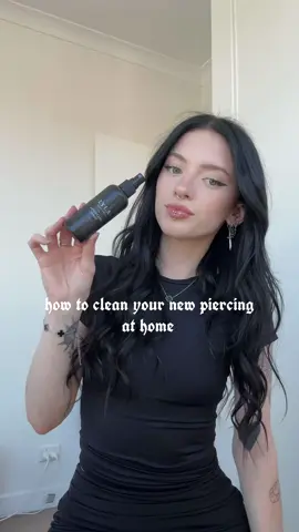 Piercing aftercare 🖤  ✧Wash hands thoroughly before touching your piercing  ✧Apply aftercare spray directly onto the entry and exit of your piercing 2-3 times per day ✧Remove crust build up by saturating a cotton swab and gently clear any debris away ✧ Dry area with a clean, disposable, single use product by gently patting under and around your piercing.   #piercing #piercingaftercare #bodypiercer #melbourne #alt #bodypiercing #hiddenhelix 