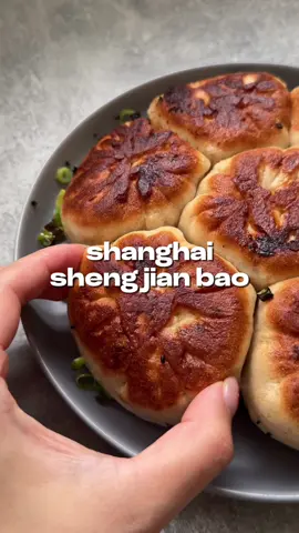 Homemade CRISPY PAN FRIED DUMPLINGS. FULL INSTRUCTIONS can be found @olive magazine and veggie variations & non-meat options on my website (or Google “verna shengjianbao”) This is how to make my favourite Shanghai shengjianbaos that’s totally worth the time and effort. They’re juicy af and soooo delicious.  I did the half yeasted version, which means it doesn’t fully double in size as it proofs, but still more fluffy than a usual dumpling dough. For the dough: - 250g/2 cups plain flour - 1 tsp sugar - 1 tsp instant dried yeast - 140ml lukewarm water For the filling, you can make lots of different ones, but I did a basic pork one, which I used: - 250g pork - Bunch of spring onions, finely chopped - 1/4 chinese cabbage, finely chopped (salted to remove excess water) - 1 whole egg - 1 tbsp light soy sauce - 1 tsp of sesame oil - Pinch of white pepper - Pinch of sugar - 1/2 tsp of salt - Chicken stock jelly (optional)