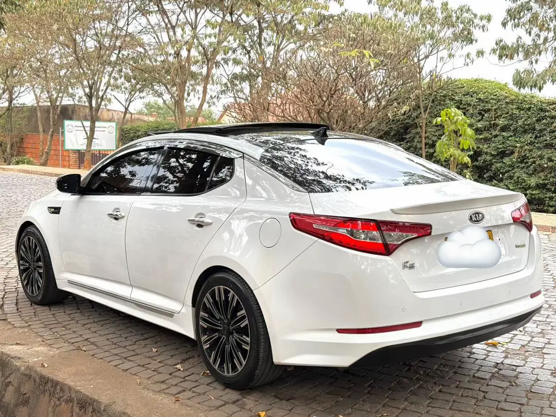 MARKE: KIA/ K5 -Model:2012 -mileage:75800KM -fuel:hybrid  -ORIGINAl :KOREA  -Original paint -Good conditions  -Full documents till 2026 -price 10M Frw  more details 0787859819#tiktokkigali🇷🇼🇷🇼 #CarForSaleRwanda #FuelSaver #hybrid 