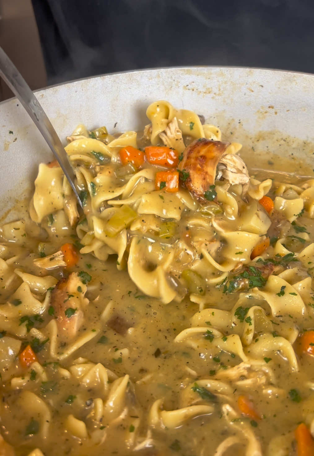 Homemade Chicken Noodle Soup!  Sometimes all you need is a warm hearty bowl of chicken noodle soup, easy to make and filling! Good to freeze too!  Full ingredient list:  2 lb chicken breast (or shredded rotisserie)  4-6 cups chicken broth (or water + better than bouillon base)  3-4 medium carrots chopped  3-4 celery stalks chopped  1/2 medium onion diced  1 medium potato diced  1-2 tbsp garlic paste or minced garlic  1-2 thyme sprigs chopped 1-2 rosemary sprigs chopped  10 oz can cream of chicken soup 10 oz can cream of mushroom soup  Seasoning used:  2-3 tsp garlic powder 2-3 tsp onion powder  2-3 tsp dried oregano  2-3 tsp black pepper 1-2 tsp smoked paprika  2-3 tsp salt (optional)  Egg noodles (preferred amount)  Parsley to garnish (optional)  #chickennoodle #soup #eatwitzo 
