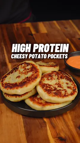 High Protein Cheesy Beef Potato Pockets! 🔥🧀🥩🥔 #mealprep #highprotein #cheesypotatopockets #hotpockets #highproteinmealprep #tastymealprep #easymealprep #lowcalorierecipes #gymfood #musclegain #fatloss #highproteinrecipes #panaceapalm #EasyRecipes ONLY 296 calories, 24g Protein! Easy High Protein Meal Prep 😋 Checkout my High Protein Cookbook with 180+ recipes and calorie tracking barcodes! (Link in bio) 📕👨🏽‍🍳  Makes 8 Pockets 🔥 Calories & Macros 📊 Per Pocket: 296 calories  24g P | 31g C | 8g F   Beef filling  - 500g lean ground beef (5% fat or less)  - 1 medium diced white onion  - 10g diced chilli (optional for heat - sub with 1/2 tsp cayenne) - 1 tsp garlic powder - 1 tsp smoked paprika - 1 tsp salt  - 1 tsp black pepper - 1 tsp mixed herbs - Cooking spray    Potato Pocket Dough - 900g peeled potatoes (chop and boil in salted water starting from cold for an even cook) - 125g (1 cup flour) - 1 egg - Salt to taste Mix to form a dough, it may be a little sticky, lightly grease your hands to help with handling Pocket assembly  - 1/8 potato pocket dough - 1/8 meat filling (weigh out total mixture and divide by 8 for gram amount) - 20g low fat grated cheese  Place in a pan with cooking spray on medium-low heat, cover with a lid and cook for 1-2 minutes on each side till golden brown 🔥 Storage & Heating ♨️ - Once cooled wrap in foil and store in the fridge or freezer - To reheat from the fridge, unwrap from the foil and microwave for 1-2 minutes. toast in the pan for a couple minutes to get crispy again - to reheat from the freezer unwrap from the foil, wrap in a damp paper towel and microwave for 2-3 minutes. Then remove the towel and pan toast to get crispy, enjoy! Checkout my High Protein Cookbook with 180+ recipes and calorie tracking barcodes! (Link in bio) 📕👨🏽‍🍳 