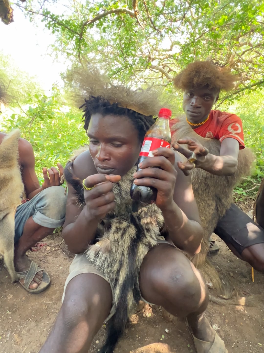 Hadzabe Tribe opening Coca-Cola‬ 1st Time#Hadzabe #Tanzania #Tribe