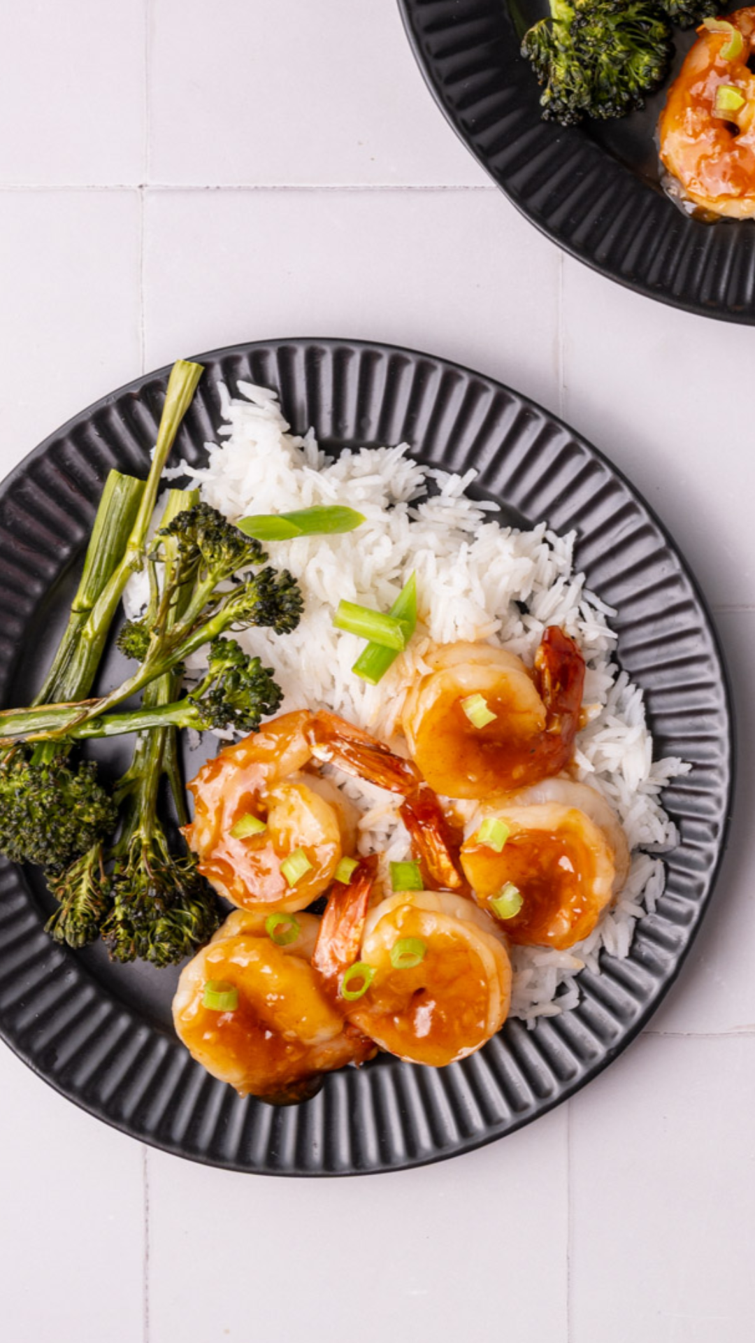 This Honey Garlic Shrimp recipe is a perfect easy weeknight dinner, coming together in just 15 minutes with a sticky sauce that's beautifully balanced between sweet, savory, and spicy.   Sticky Spicy Honey Garlic Shrimp -½ pound raw large white shrimp -1 tablespoon olive oil -4 cloves garlic (minced) -2 tablespoons soy sauce -2 teaspoons Sriracha -¼ cup honey -1 teaspoon cornstarch -1 stalk scallion (optional for garnish)   -Peel the shrimp if need be and pat both sides dry with a paper towel. -Minced the garlic and add it a frying pan with olive oil over medium heat for about 2-3 minutes until the oil is shimmering and the garlic is fragrant. -Carefully lower the shrimp into the hot oil and cook for 2 minutes on each side. -Meanwhile, make the sauce in a bowl by whisking together the soy sauce, honey, sriracha, and cornstarch. -Continue to cook over medium heat until the sauce thickens (cornstarch will start to thicken sauce once it reaches 295°F) and the internal temperature of the shrimp reaches 145°F. Toss to coat the shrimp in a thick layer of sauce. Option to garnish with diced scallion. Enjoy!  #HoneyGarlicShrimp #StickyGarlicShrimp #SweetAndSpicyShrimp