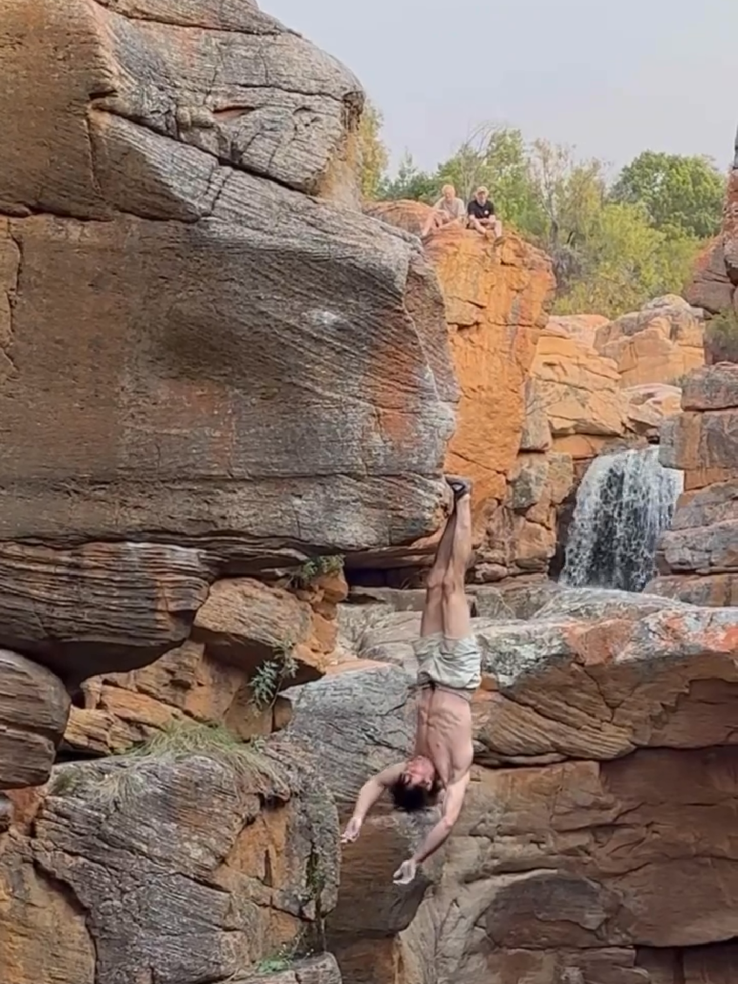 Ethan Pringle defies gravity with the 'Bat-Hang', a thrilling challenge for any climber. Rocklands is a popular bouldering destination in South Africa. It is located under 125 miles from Cape Town, on the edge of the Cederberg Mountains. The area is known for its abundance of bright-orange sandstone boulders. Performed by a professional, do not attempt! #Unreel #Extreme #Climbing #Rockclimbing #bathang #climbingtok