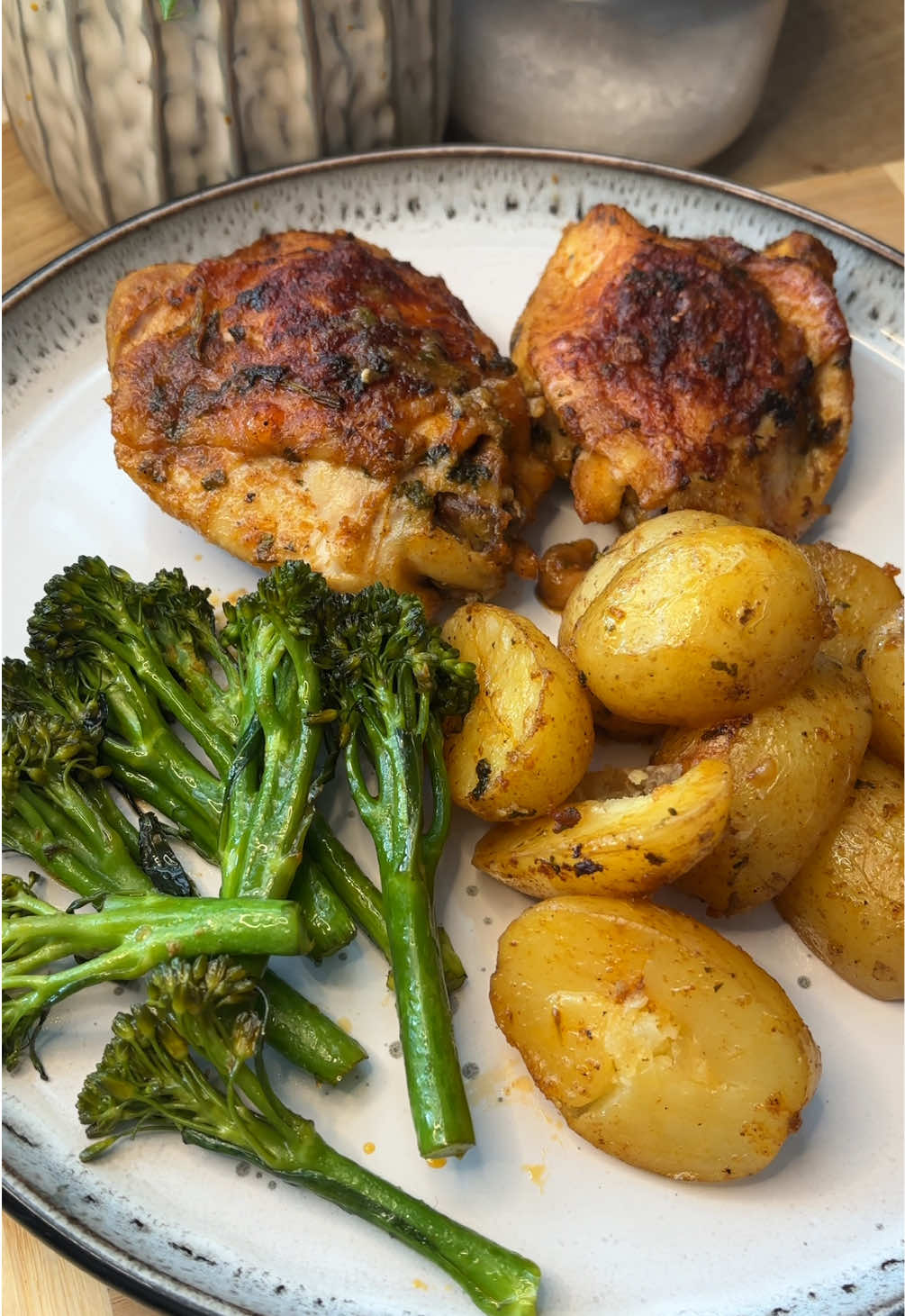 One Pan Baked Chicken & Potatoes✨🥔🍗  Here’s the full recipe👇🏽: (Serves 3)  For the Marinade: 2 tbsp butter, melted 1 tbsp olive oil 3 tsp garlic purée Fresh coriander, finely chopped 2 tsp smoked paprika 2 tsp all-purpose seasoning 1 tsp cumin ¼ tsp turmeric Salt & pepper, to taste Juice of ½ lemon Other Ingredients: 6 chicken thighs (bone-in, skin-on) 200g baby potatoes, halved Tenderstem broccoli Preheat oven to 200°C fan.  Mix all marinade ingredients together in a bowl. Add chicken thighs and halved baby potatoes to a baking dish. Pour over the marinade and coat everything well.  Cover with foil or baking paper and bake for around 25-35 minutes. Remove the foil, baste the chicken with the liquid in the pan, and bake uncovered for 20-30 minutes (or until skin is golden). Add the Tenderstem broccoli and bake for a final 10 minutes, until everything is cooked through and golden. #EasyRecipe #cookwithme #bakedchicken #bakedpotato #DinnerIdeas 